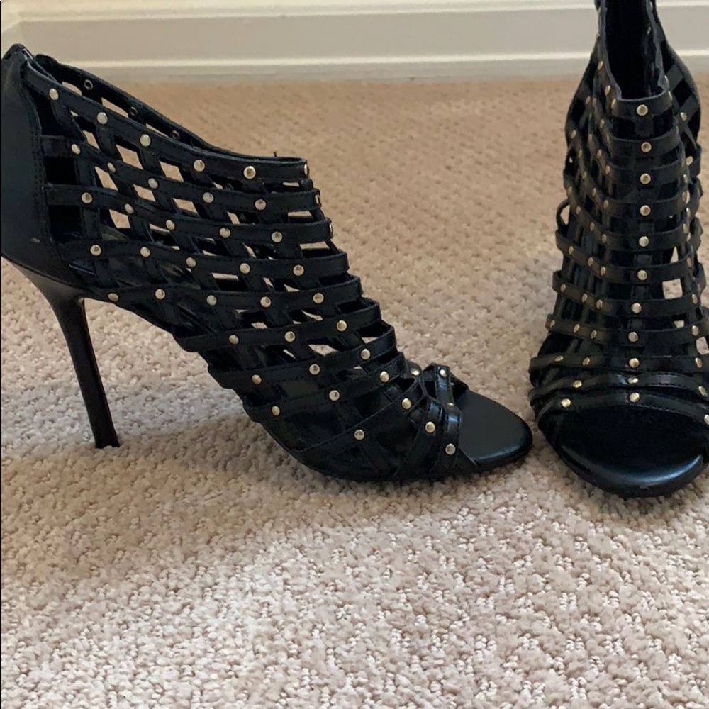 Black thin heel with lattice and stud details
